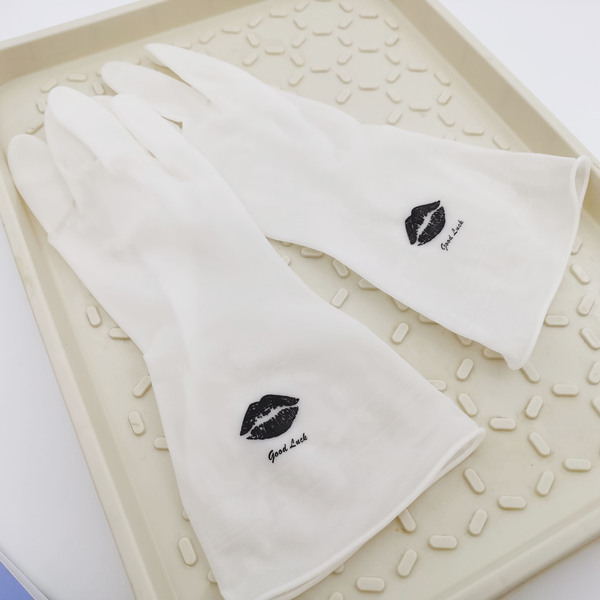 Rubber transparent white plastic gloves