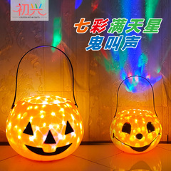 満天の星のカボチャの明かりのハロウィンの子供のカボチャの桶の提灯の手提げの道具の回転の発光の帯の音楽の装飾