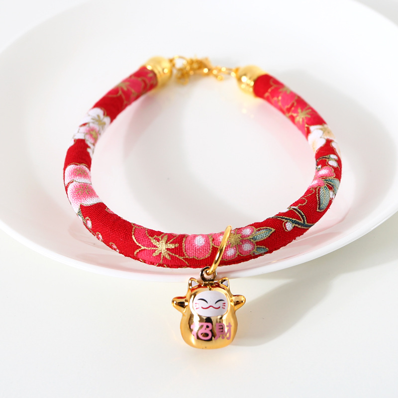 Japón y flores de viento para atraer la fortuna gatos campana de bronce ajustable mascotas gatos perros collares accesorios de comercio exterior