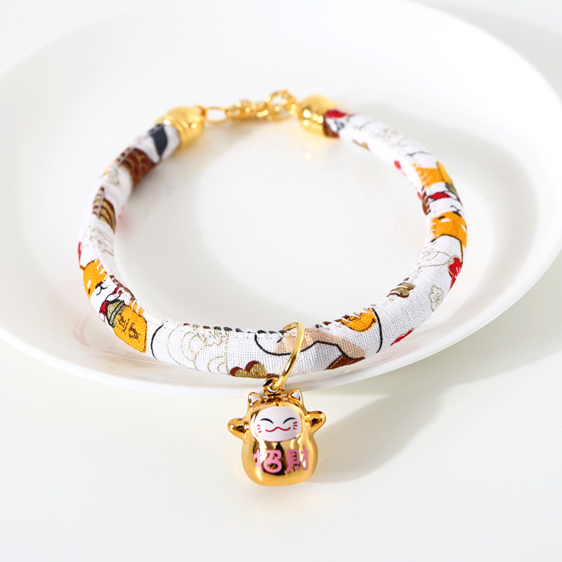 Japón y flores de viento para atraer la fortuna gatos campana de bronce ajustable mascotas gatos perros collares accesorios de comercio exterior