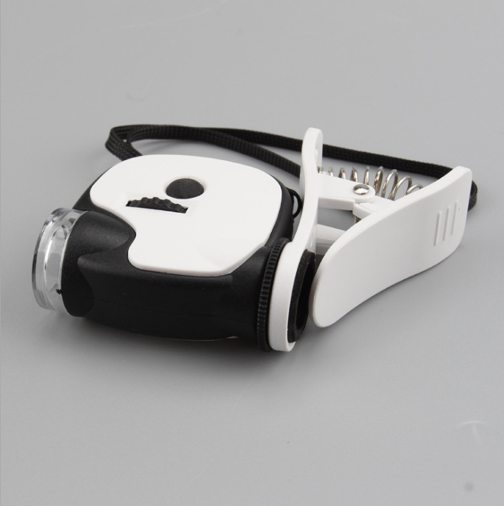 新款带手机夹子55倍迷你显微镜带LEDUV验钞灯便携式显微镜7004DB