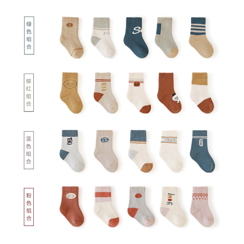 Calcetines de los nuevos niños de 20 años calcetines de Terry engrosados de otoño e invierno estilo coreano algodón peinado calcetines de bebé de media pantorrilla al por mayor
