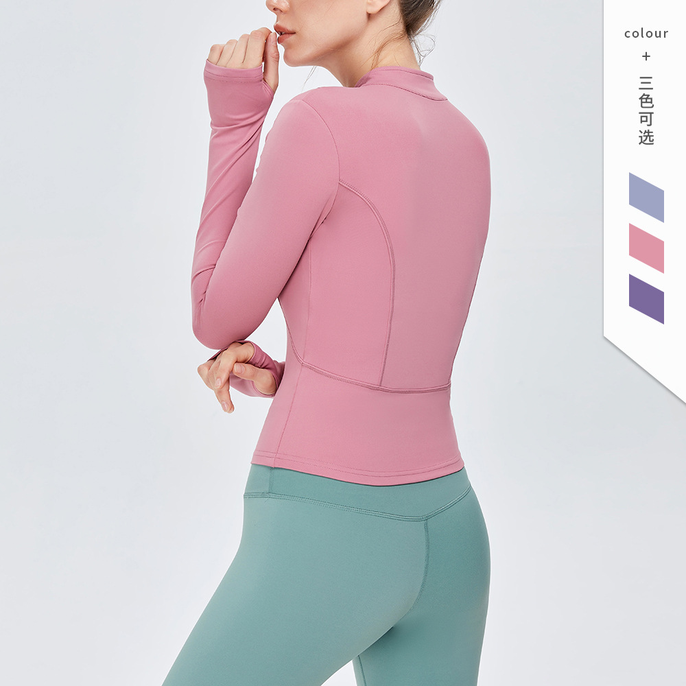 En stock Otoño e Invierno nuevo europeo y americano desnudo chaqueta deportiva Slim adelgazamiento yoga ropa mujer cremallera manga larga fitness top