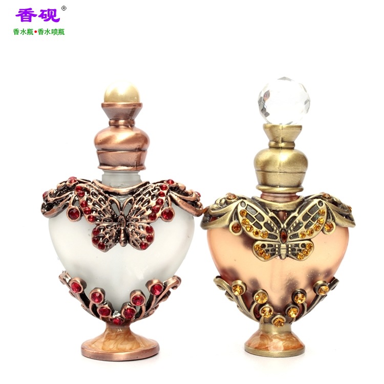Botella de perfume al por mayor esencia sub-botella 10ml melocotón corazón aceite esencial botella de perfume tatuaje botella de bordado aromaterapia adornos de joyería