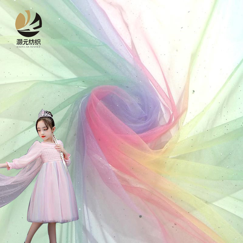 Fabricantes promocionales de bajo precio arco iris tela de malla gradiente impresión digital sin paleta ropa infantil tela de vestido