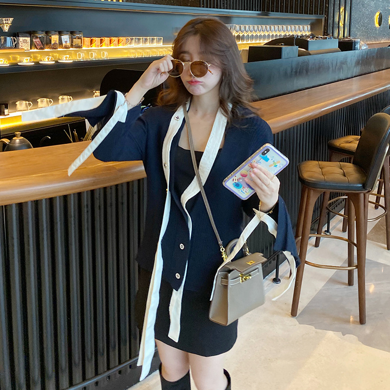 Autumn New Women's Tops Asymmetrical Knitted Fine Wool Cardigan Autumn New Women's Tops Asymmetrical Knitted Fine Wool Cardigan