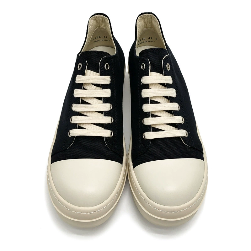 Unisex black canvas low-top platform sneakers detail 4