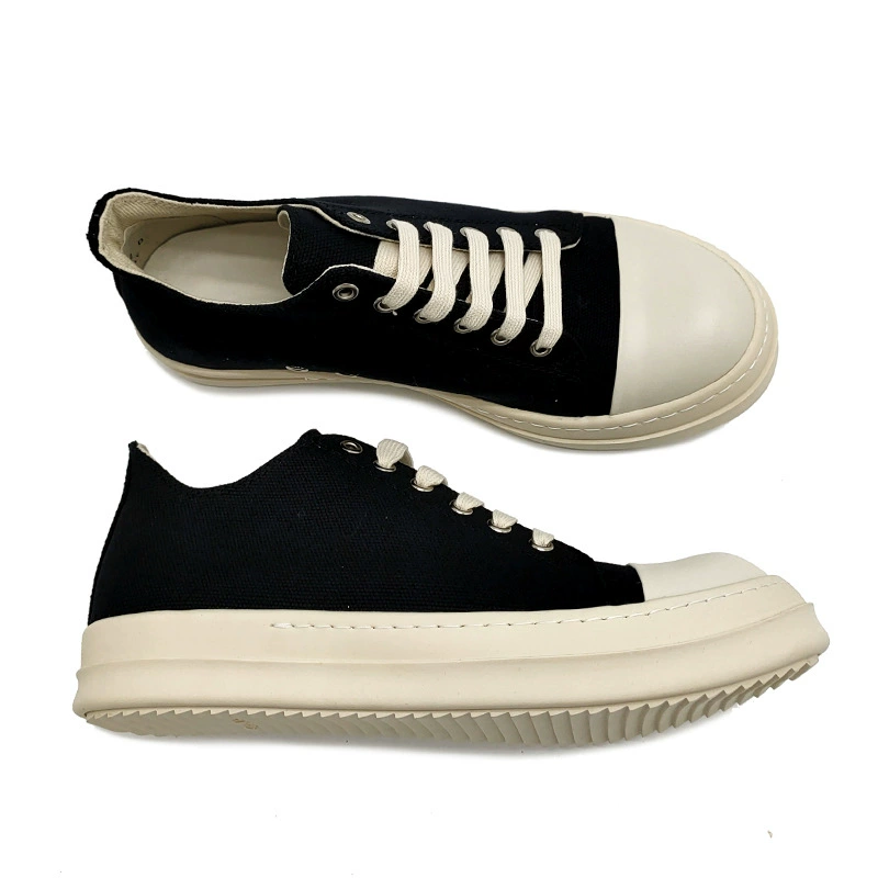 Unisex black canvas low-top platform sneakers detail 1
