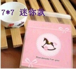 新款上市 童趣木马自粘袋 饼干袋 塑料袋 烘培包装7*7+3 100个价