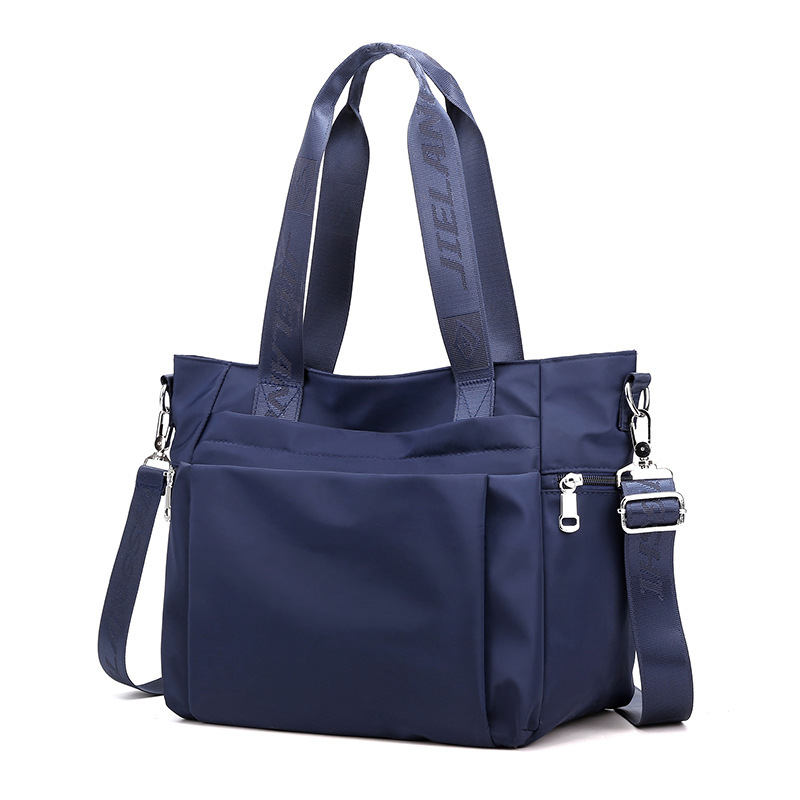 Moda simple bolsa de tela de nylon de gran capacidad bolsa de hombro ligera del todo-fósforo de las mujeres de moda casual bolsa de mensajero portátil al por mayor