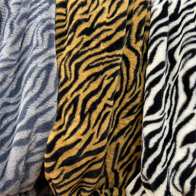Estampado de leopardo patrón horizontal pequeña piel de conejo impresión Imitación Piel de conejo franela ropa abrigo tela de felpa alfombra de juguete en stock