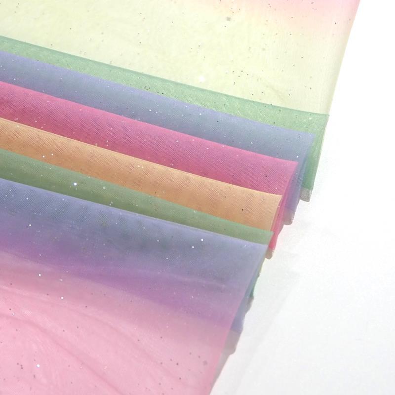Fabricantes promocionales de bajo precio arco iris tela de malla gradiente impresión digital sin paleta ropa infantil tela de vestido