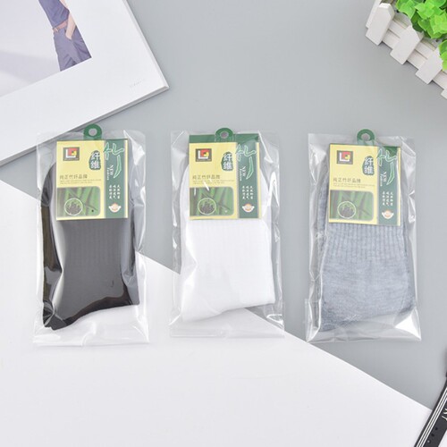 Manufacturer wholesale independently packaged men's solid color casual polyester foot bath socks disposable cheap bamboo label men's socks