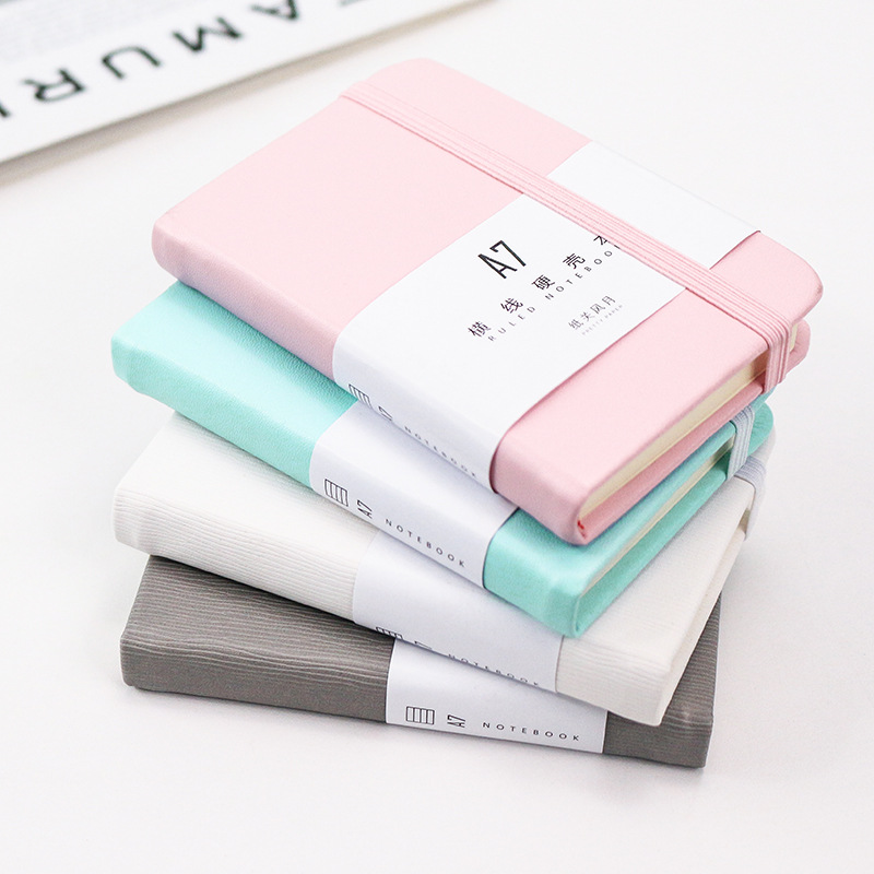 Mini cuaderno pequeño personalizado cuaderno pequeño a7 libro de bolsillo grueso con cinturón portátil bloc de notas libro de cuentas manual al por mayor