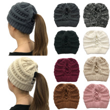 2020秋冬新款跨境电商新款马尾毛线帽女士洞洞交叉纯色毛线帽子