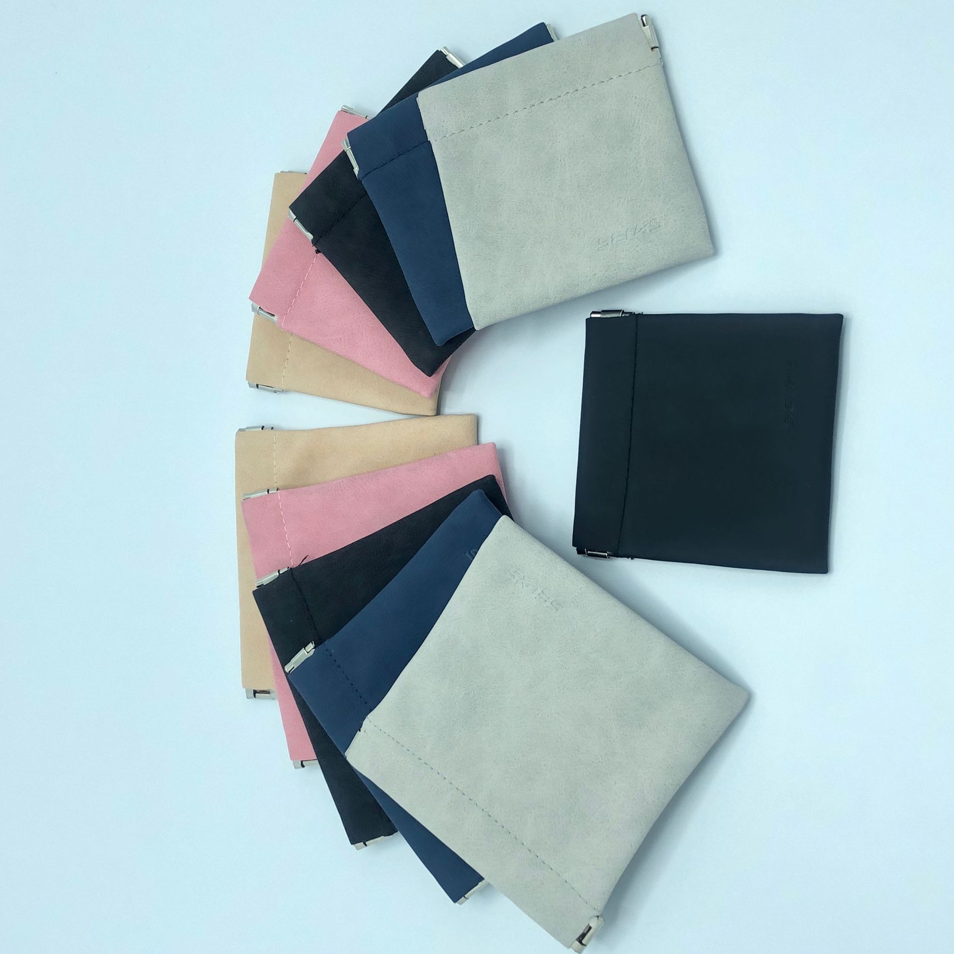 厂家批发零钱钥匙收纳袋弹片pu皮革收纳袋耳机收纳袋支持多色