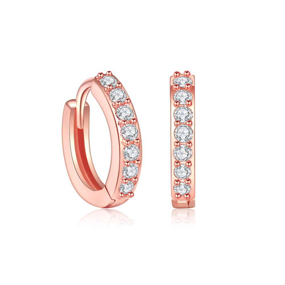 Ventas directas de la fábrica de moda clásica pequeña oreja hueso oreja hebilla pendientes redondos hembra pequeña personalidad pendientes simples