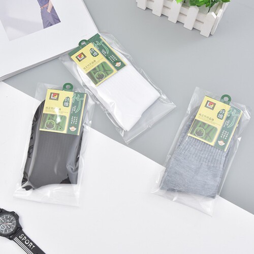 Manufacturer wholesale independently packaged men's solid color casual polyester foot bath socks disposable cheap bamboo label men's socks