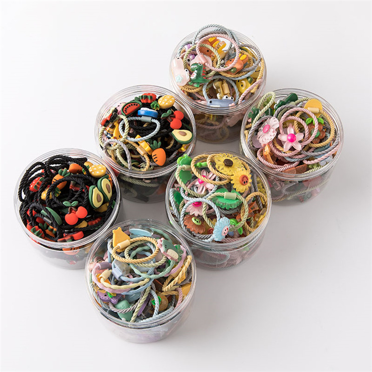 Nuevo estilo coreano bebé cuerda de pelo lazo de pelo banda de goma cuerda de pelo de dibujos animados caja de plástico enlatados niños de dibujos animados banda de pelo al por mayor