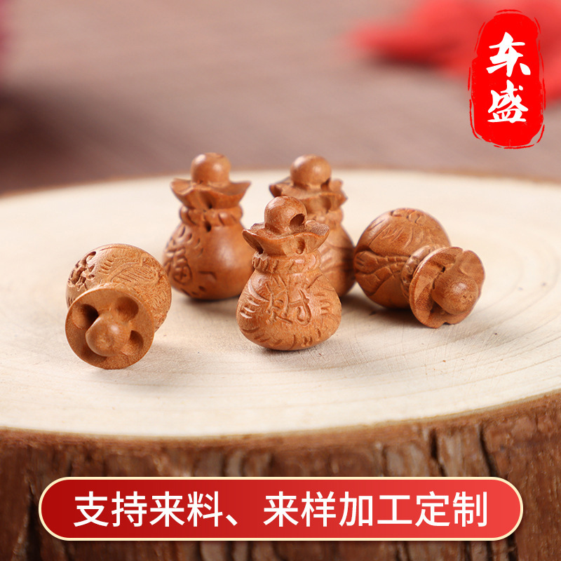 Dongsheng peach small lucky bag pendant accessories jewelry keychain handmade wooden crafts wholesale Dongsheng peach small lucky bag pendant accessories jewelry keychain handmade wooden crafts wholesale