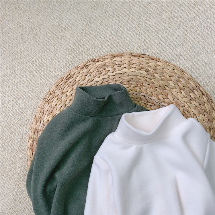 Ropa infantil de estilo coreano para bebés y niños pequeños, camiseta básica de cuello medio alto para otoño e invierno, sudadera versátil de manga larga de color liso para bebés, conjunto de otoño.