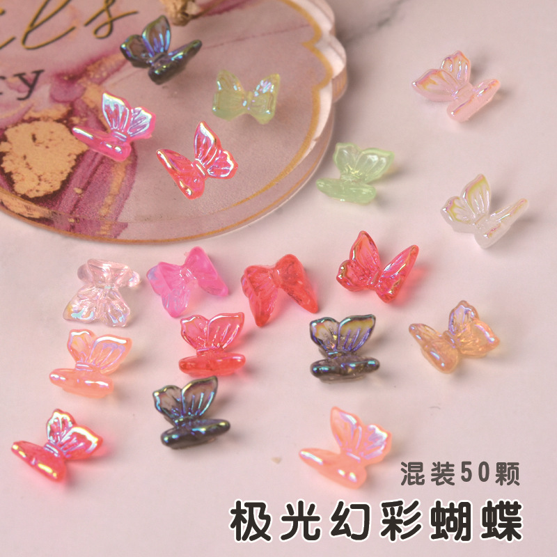 50 fábrica al por mayor uñas Red Butterfly Libro rojo con el mismo tipo de resina color hielo mezclado Aurora pequeña mariposa