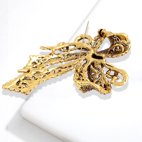 Cross-border hot selling creative rhinestone brooch alloy electroplated retro bow women's corsage high-end accessories pin