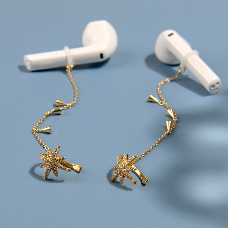 KJ cobre con incrustaciones de circonio auricular cadena anti-perdida clip de oreja hembra transfronteriza pendientes de moda de gama alta de seis puntas estrella auricular anti-perdida pendientes