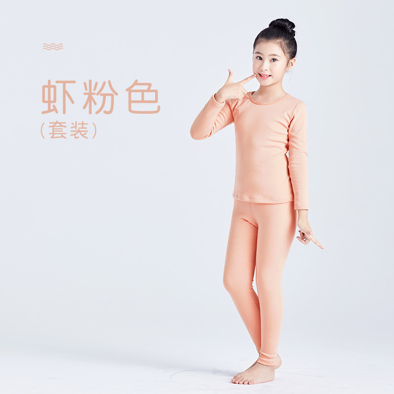 Ropa interior térmica de terciopelo camisa de fondo sin costuras niños y niñas ropa de otoño pantalones largos medio y grandes niños otoño e invierno sin costura ajustada al por mayor