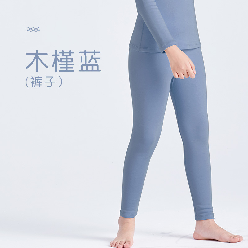 Ropa interior térmica de terciopelo camisa de fondo sin costuras niños y niñas ropa de otoño pantalones largos medio y grandes niños otoño e invierno sin costura ajustada al por mayor