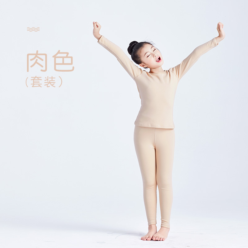 Ropa interior térmica de terciopelo camisa de fondo sin costuras niños y niñas ropa de otoño pantalones largos medio y grandes niños otoño e invierno sin costura ajustada al por mayor