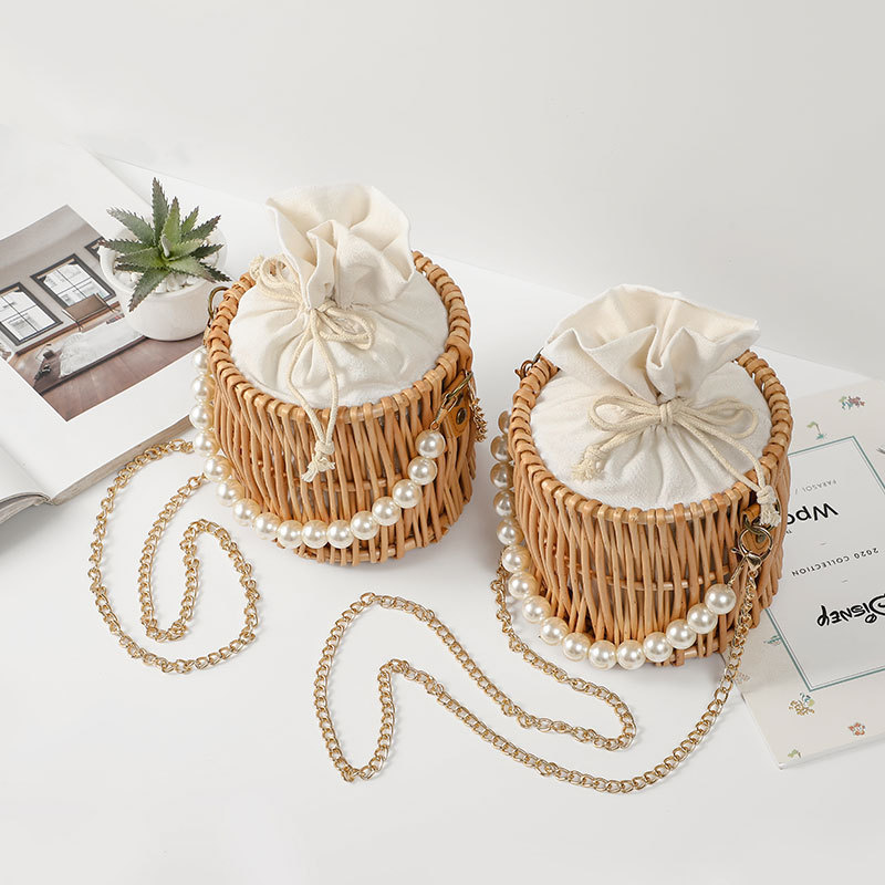 Bolso de paja de verano para mujer 2021 Nuevo bolso de celebridad de Internet bolso de perlas bolsa de ratán de regalo de mano bolsa de cubo de playa
