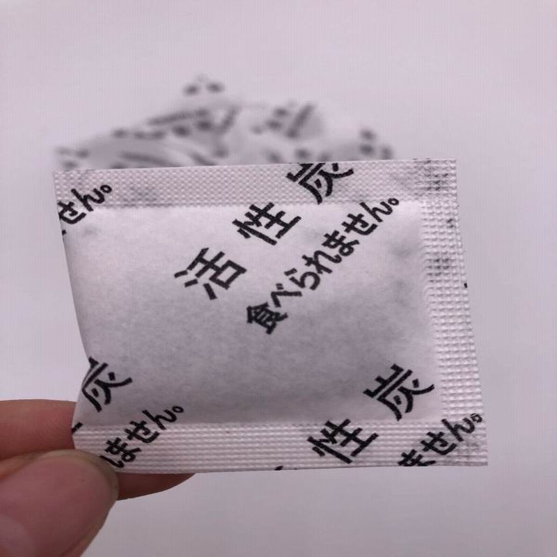 Spot 2g 3g 5g 10g chino japonés carbón activado paquete desecante taza de té paquete desodorante taza de plástico desodorante