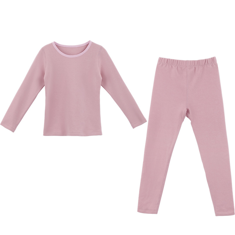 Ropa interior térmica de terciopelo camisa de fondo sin costuras niños y niñas ropa de otoño pantalones largos medio y grandes niños otoño e invierno sin costura ajustada al por mayor