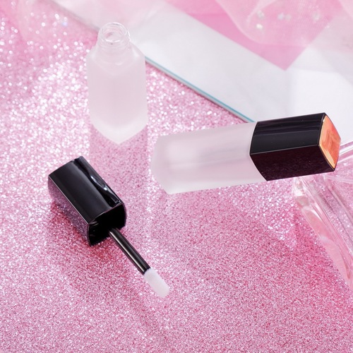 Wholesale empty lip glaze tube, empty glass tube with spray gold top and black cover, lip gloss bottle lip glaze tube
