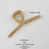 Asian gold chain cross -grabbing