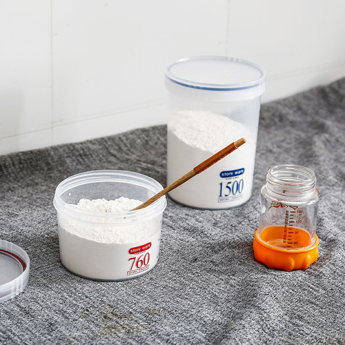 Airtight, transparent, round rotating storage jar for kitchen, made of food-grade plastic, suitable for storing grains, beans, nuts, snacks, and milk powder