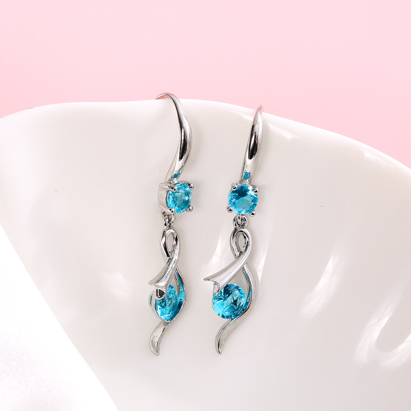 fashionable copper earrings with zircon