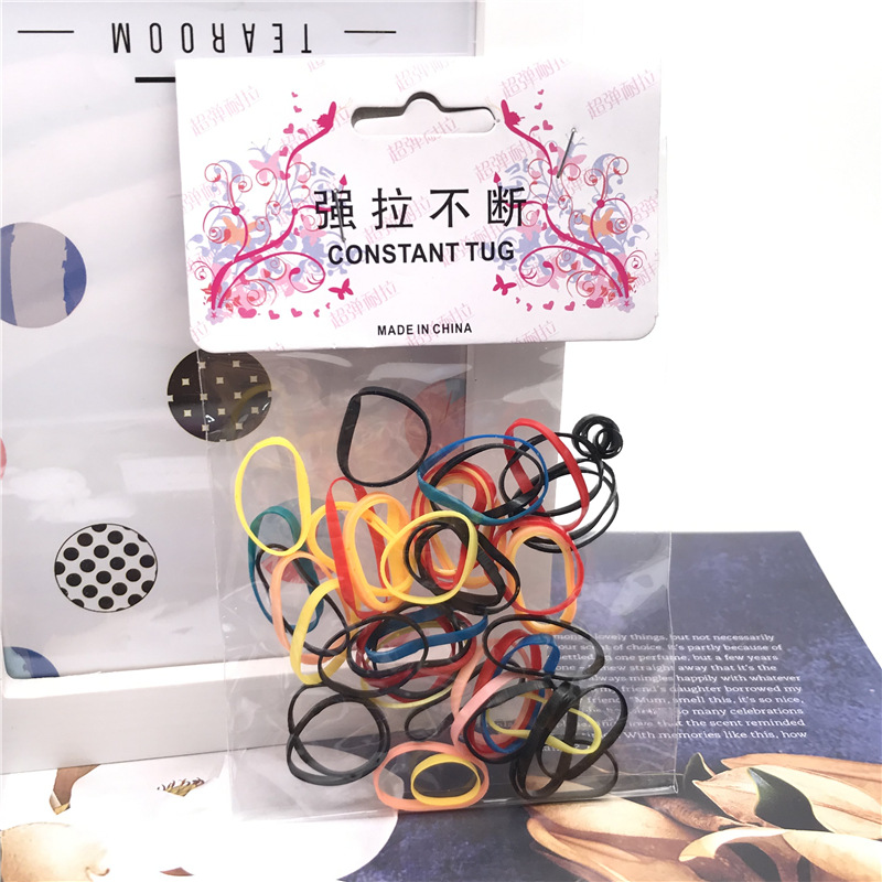 Desechables para niños horquilla banda de pelo banda de goma cuerda de pelo un yuan dos yuanes tienda accesorios para el cabello accesorios para la cabeza puesto de suministro