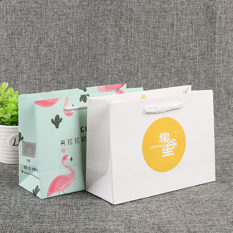 广告宣传服装店纸袋制定购物白卡包装纸袋礼品手提纸袋可印刷LOGO
