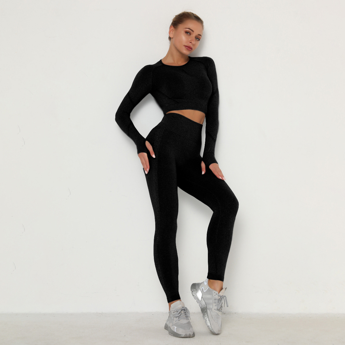 Ropa de yoga sin costuras plisada europea y americana traje de mujer de cintura alta melocotón apretado deportes manga larga fitness yoga pantalones conjunto de dos piezas