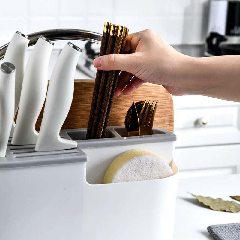 Multifunctional kitchen organizer, integrated cutting board & utensil storage, compact countertop