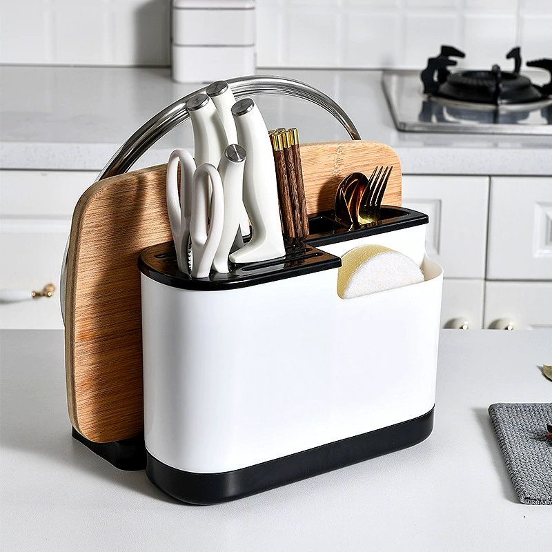 Multifunctional kitchen organizer, integrated cutting board & utensil storage, compact countertop