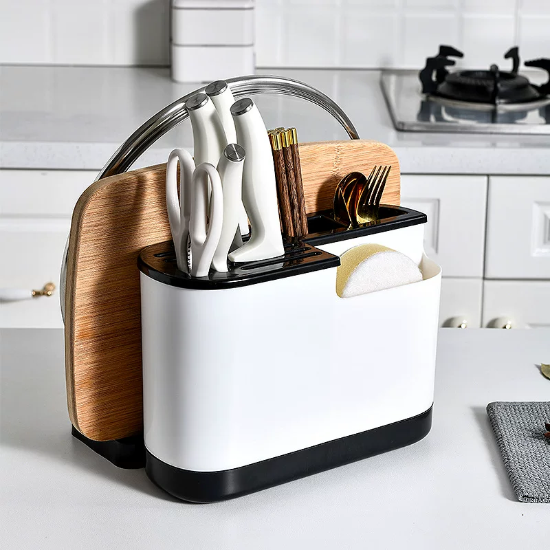 Multifunctional kitchen organizer, integrated cutting board & utensil storage, compact countertop
