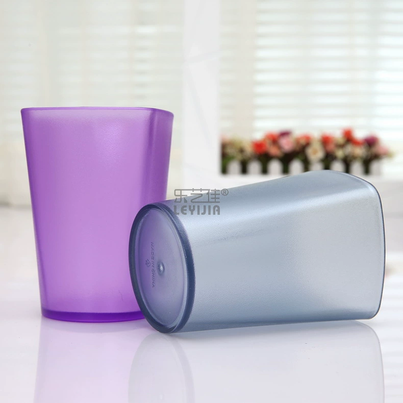 Transparent color plastic cup with cup with lemonade cup glass frosted fruit juice drink advertising cup