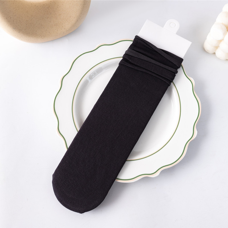 Calcetines de pila de mujer Calcetines de algodón liso de color sólido sin tacón calcetines de media pantorrilla en blanco y negro sin tacón boca suelta calcetines de confinamiento de mujeres embarazadas
