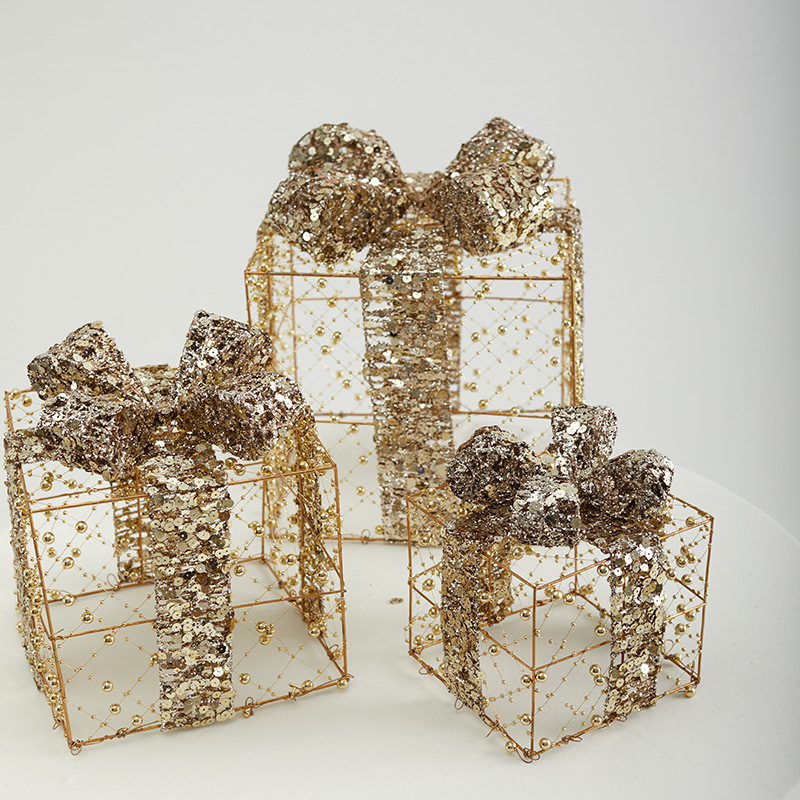 Navidad hierro forjado paquete de tres piezas hotel centro comercial ventana decoración de pavimento esquinilla oro paquete de regalo pila cabeza