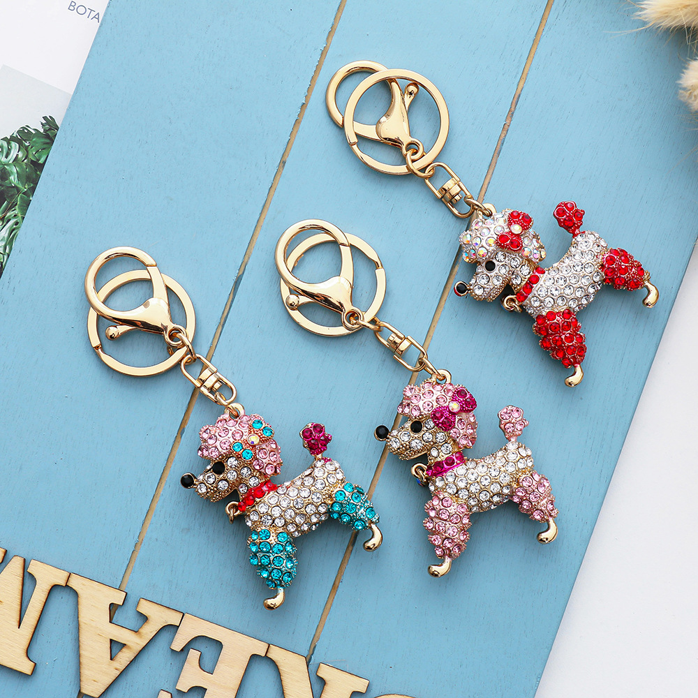 Korean color diamond-encrusted cute puppy creative metal keychain wholesale car VIP bag pendant small gift