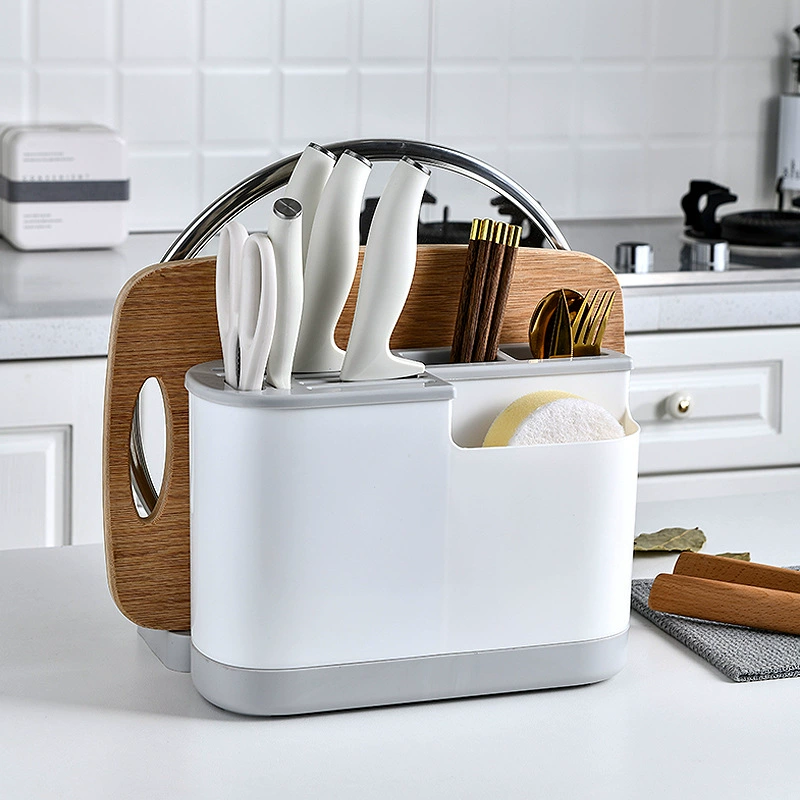 Multifunctional kitchen organizer, integrated cutting board & utensil storage, compact countertop