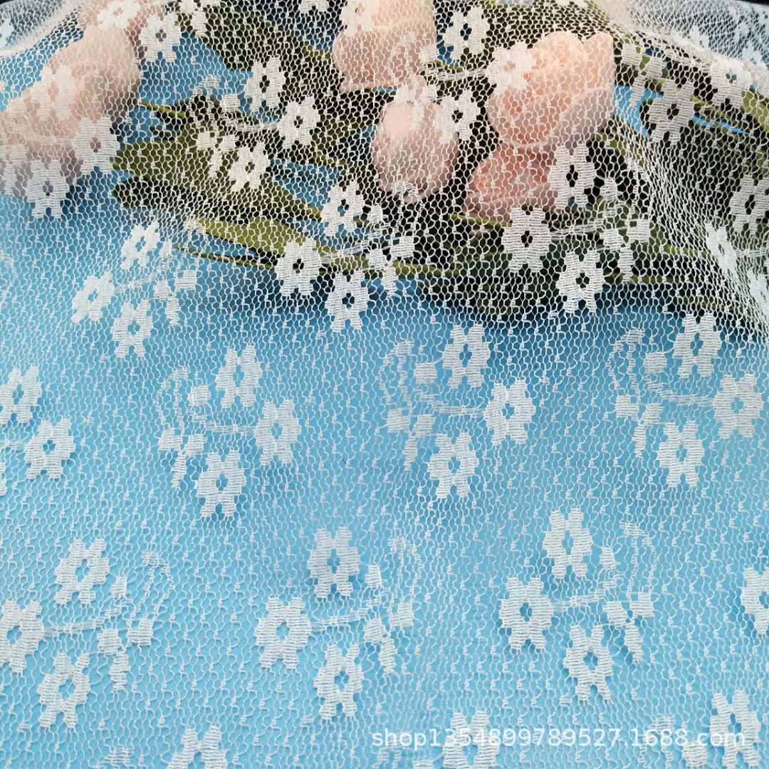 锦纶蕾丝面料现货 点点提花无弹力面料 打底衣 童装 时尚服装
